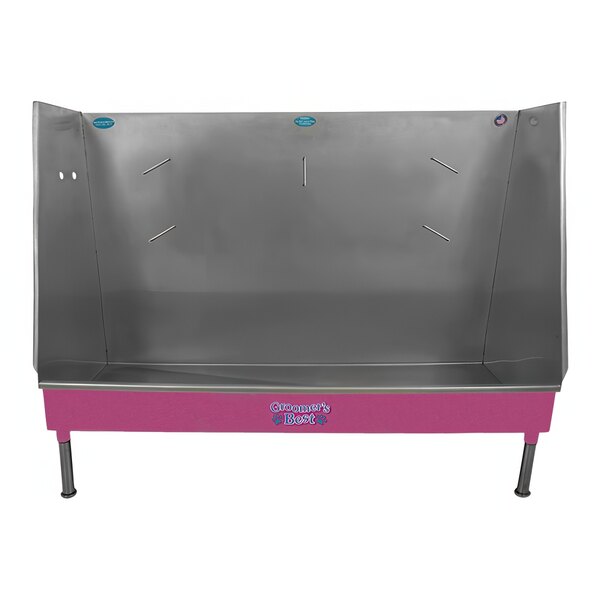A pink and silver Groomer's Best walk-in bathing tub with a left drain.