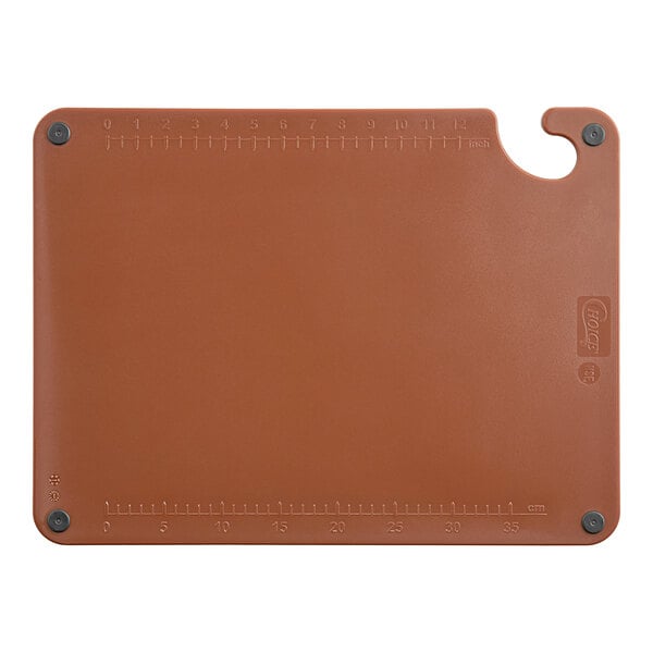 A brown plastic Choice cutting board with ruler grips.