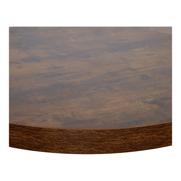 A close up of a BFM Seating Relic vintage walnut table top.