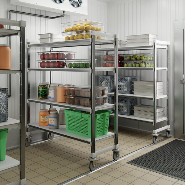 A metal shelving unit with fruits and vegetables on it.