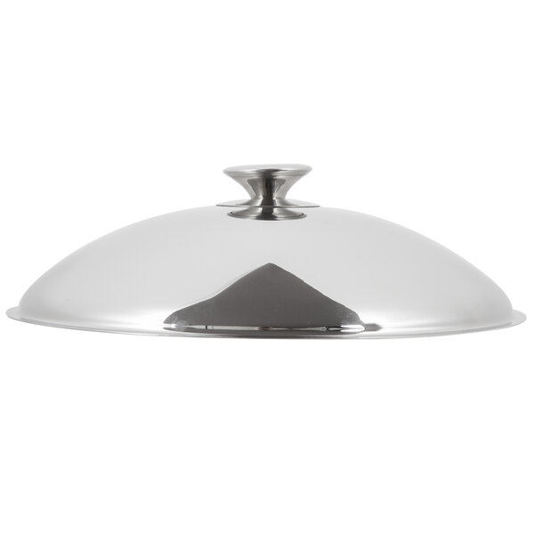 A silver dome lid with a metal Vollrath Orion Chafer lid.