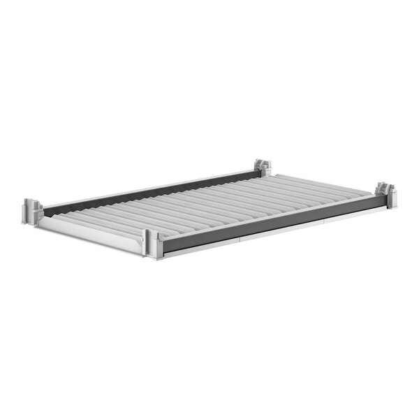 A white metal Cambro Camshelving shelf.