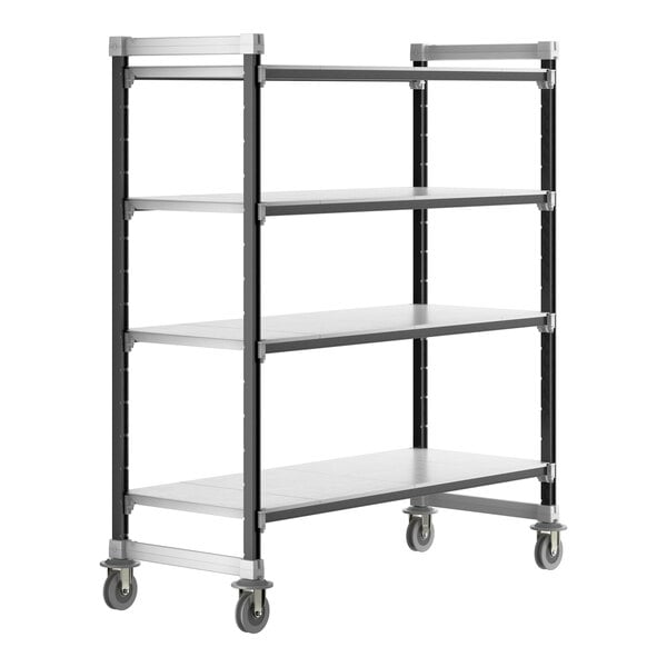 A grey Cambro Camshelving unit with four solid shelves on wheels.