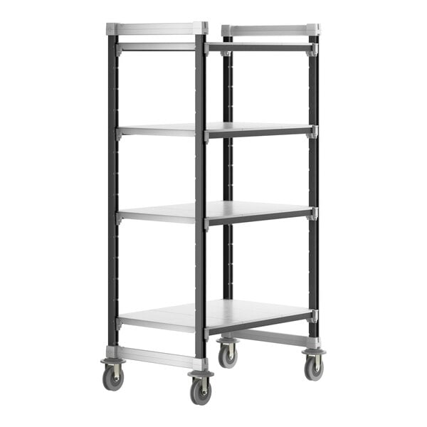 A black metal Cambro Camshelving unit on wheels with four shelves.