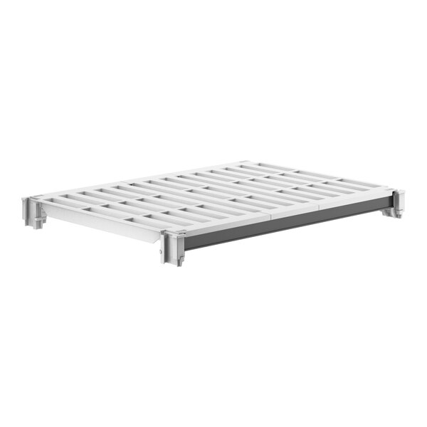 A white metal shelf with vented holes.