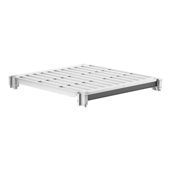 A white metal shelf with a white plastic pallet with holes on top.