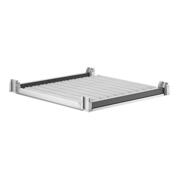 A white metal Cambro Camshelving shelf with black vents.