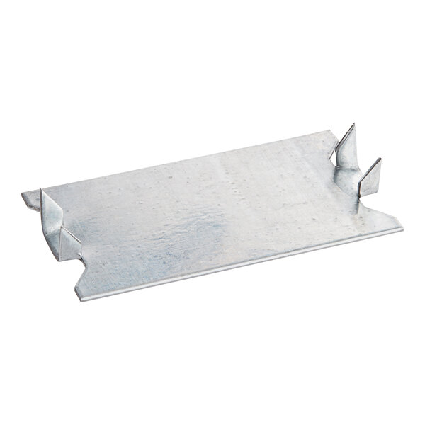 An Oatey galvanized steel self-nailing stud guard with spikes and two holes in it.