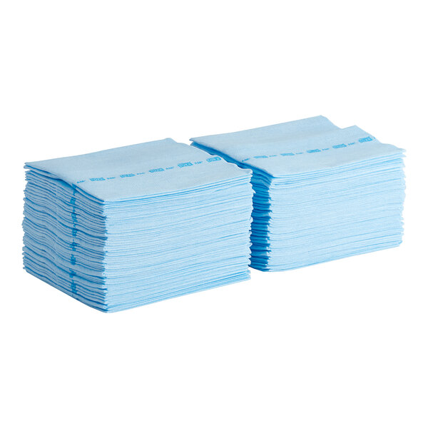 A stack of Tork blue odor-resistant food service wipers.