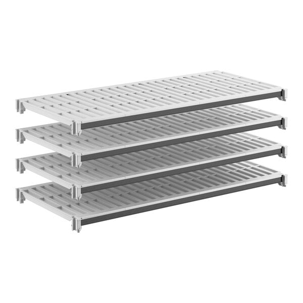 A set of four vented plastic shelving panels designed for modular shelving systems.