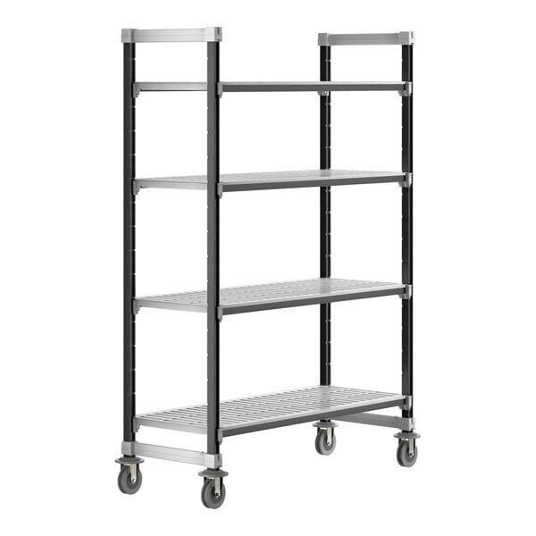 A white metal Cambro Camshelving unit with wheels and four shelves.