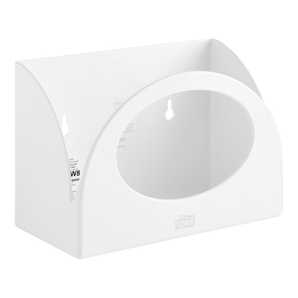 A white plastic box with a hole in it.