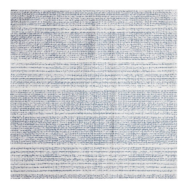 A close-up of a blue and white square cloth with a blue and white pattern.
