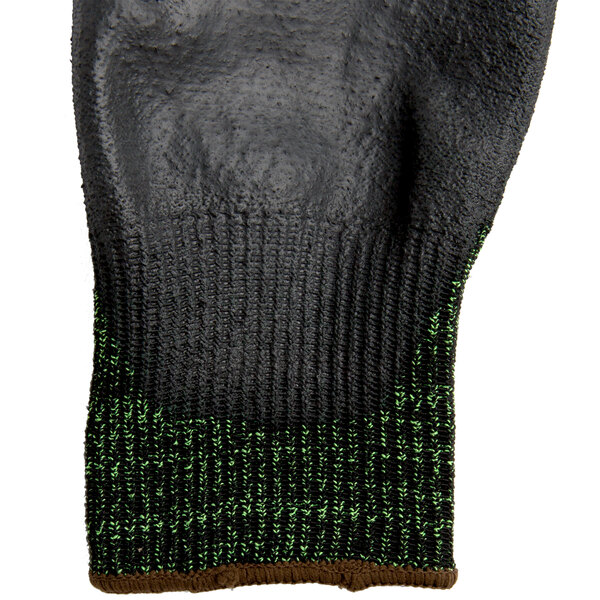 A pair of green and black Cordova Monarch cut-resistant gloves with green palm coating.