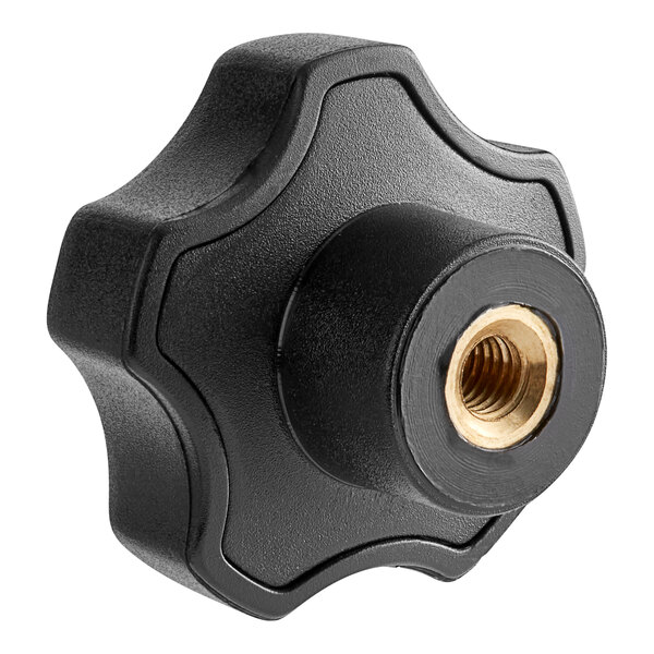 A black plastic handgrip knob with a gold nut.