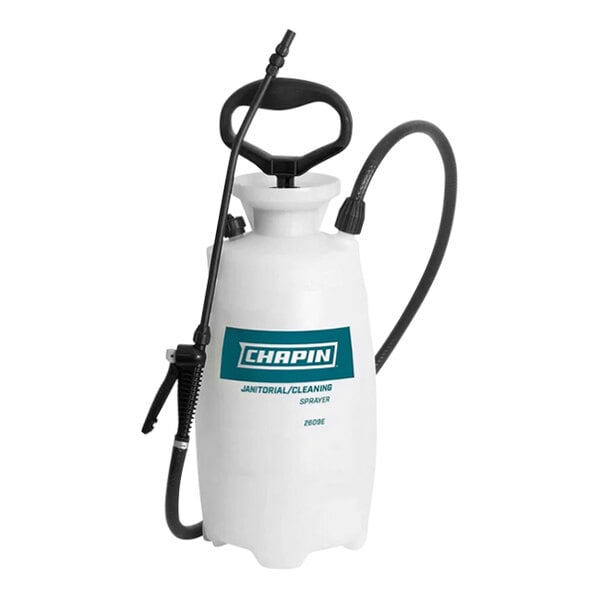 A white plastic tank sprayer with black handles and hose.