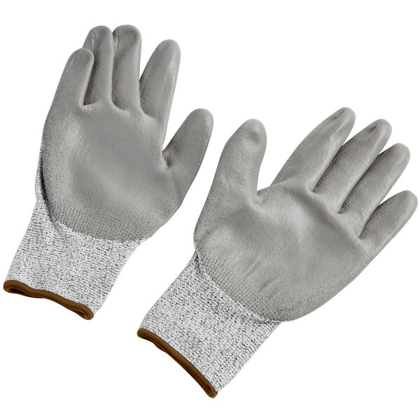 A pair of extra small Cordova grey gloves with a grey polyurethane palm coating.