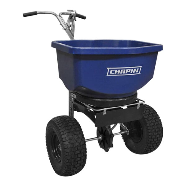 A blue Chapin broadcast spreader with wheels and a handle.