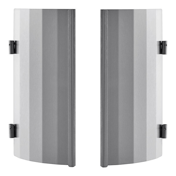 Two metal heat shields with black trim on the edges.