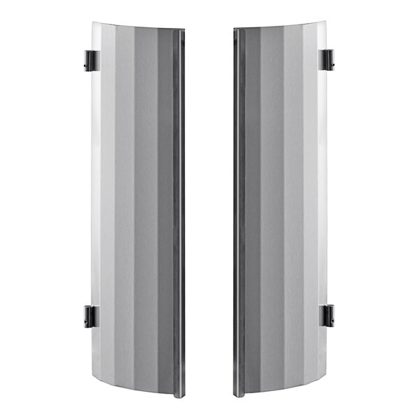 A pair of metal doors with black handles.