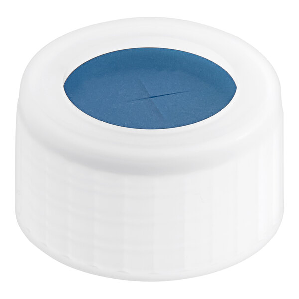 A white plastic bottle cap with a blue circle.