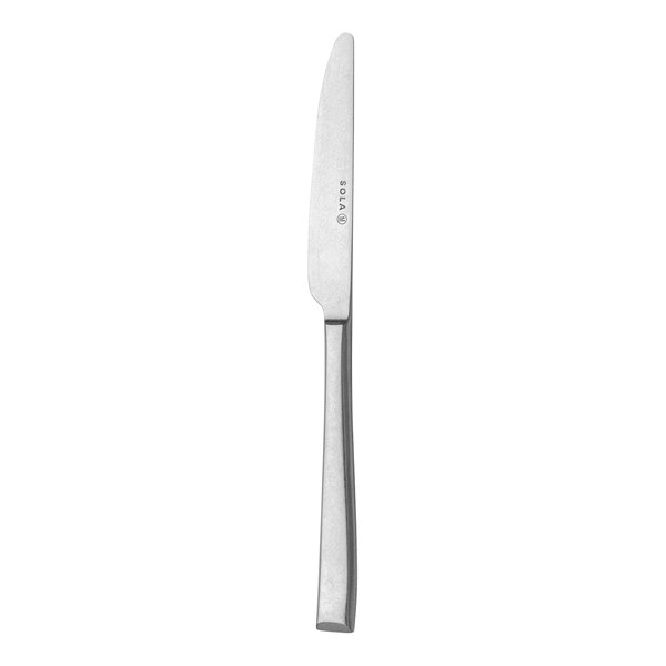 A Sola stainless steel butter knife with a silver handle.