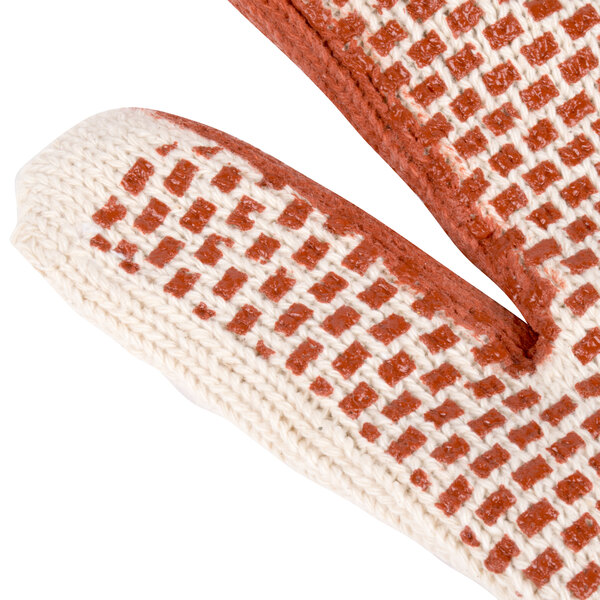 A pair of red and white knitted gloves with a brown pattern.