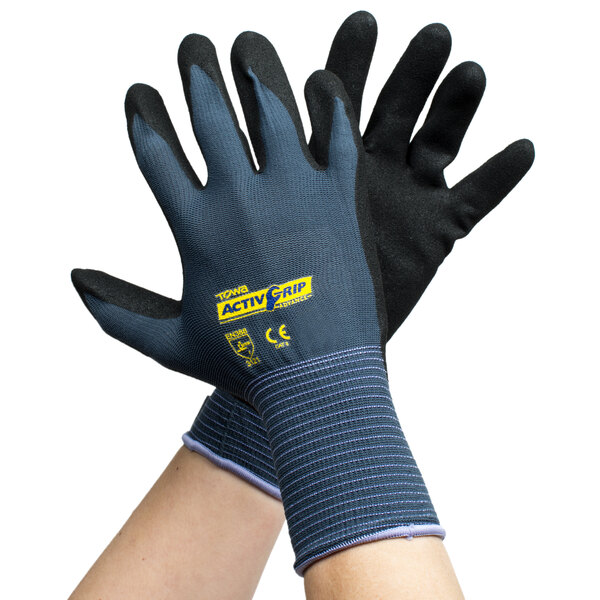 A pair of gray and purple Cordova ActivGrip Advance gloves with black palm coating on a white background.