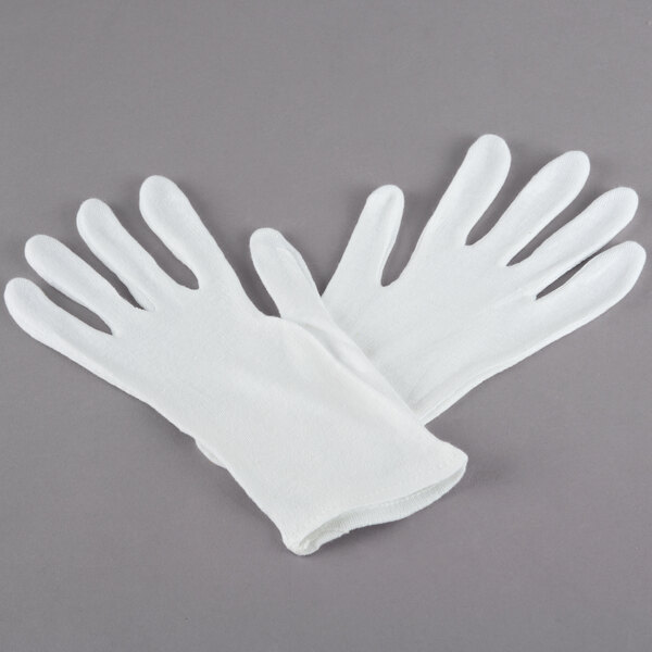 A pair of white Cordova Men's inspection gloves.