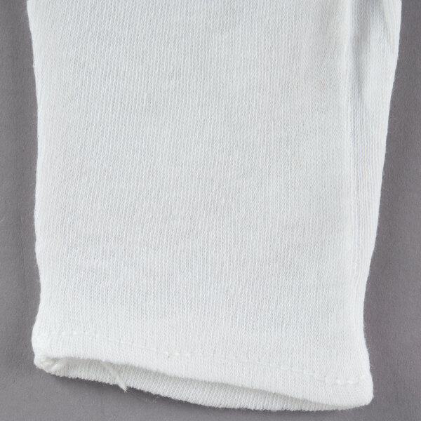 A folded white Cordova heavy weight fabric glove.