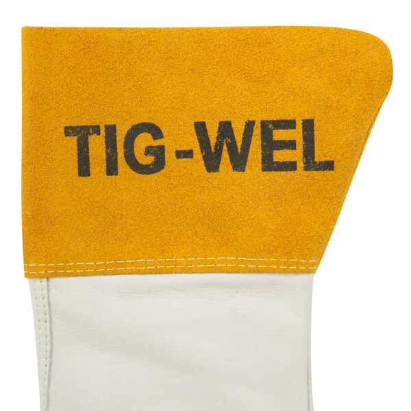A yellow and white leather Cordova Tig-Wel glove.