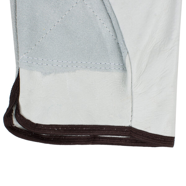 A white Cordova grain cowhide leather driver's glove with brown stitching on the palm.