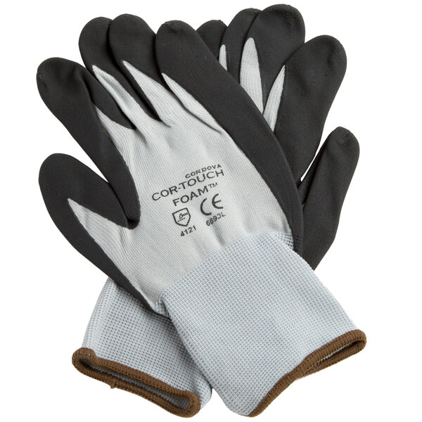 A pair of gray gloves with black foam nitrile palms.
