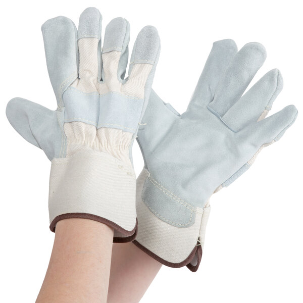 A pair of Cordova white canvas work gloves with leather palms and rubber cuffs on a white background.