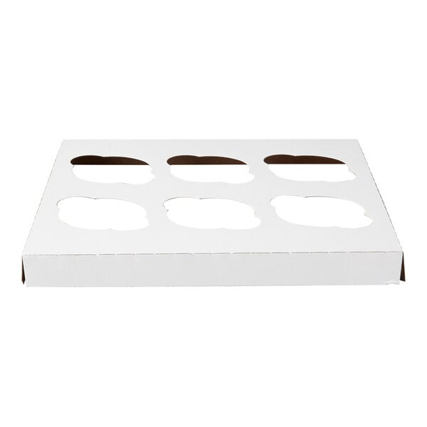 A white cardboard cupcake insert with six cut-out slots designed to hold standard-sized cupcakes in a 10 x 10 inch box.
