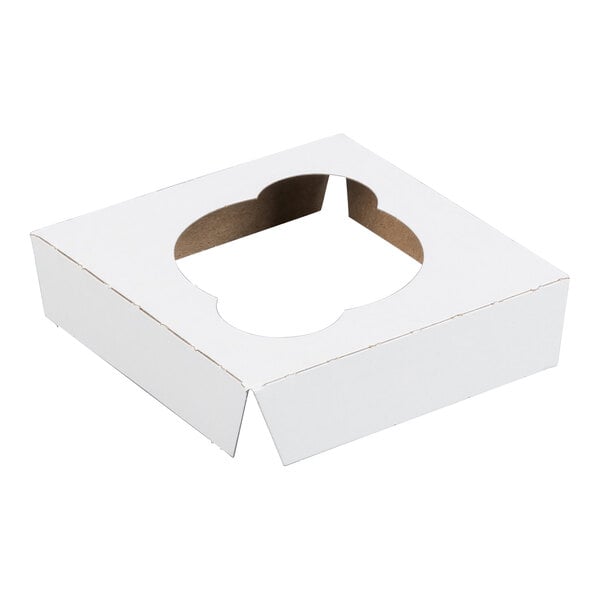 A white cardboard cupcake insert with a single round cutout, designed to hold one standard cupcake in a 4 x 4 inch box.