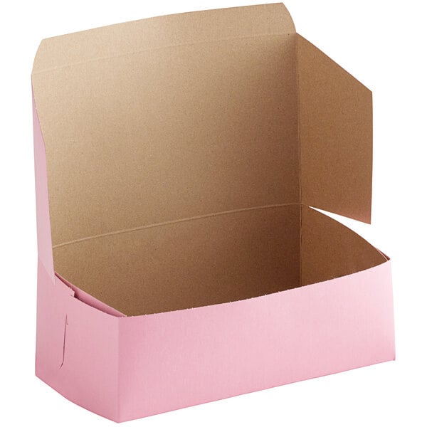 A pink Baker's Mark bakery box with the lid open.