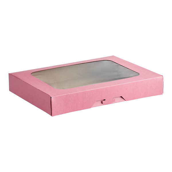 A pink Baker's Mark bakery box with a clear window.