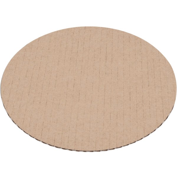 A Baker's Mark white corrugated cake circle with a thin line.