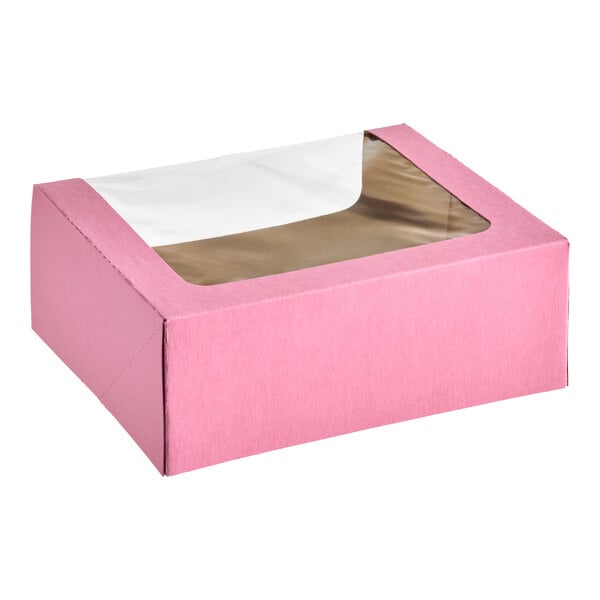 A pink rectangular box with a transparent window on the top.