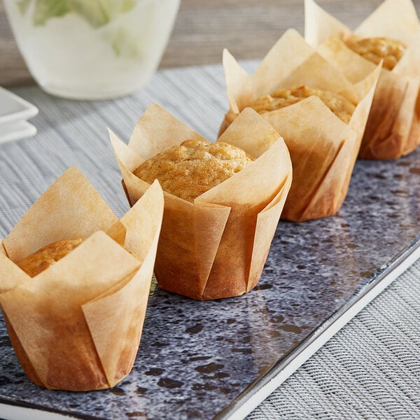 A tray of mini muffins in Baker's Mark unbleached natural kraft tulip baking cups.