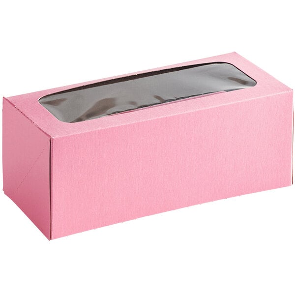 A pink Baker's Mark bakery box with a clear window.