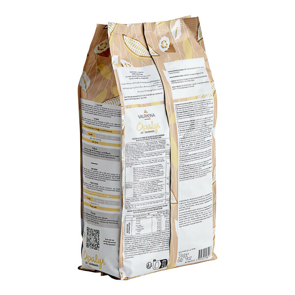 A bag of Valrhona Opalys white chocolate feves with a label.