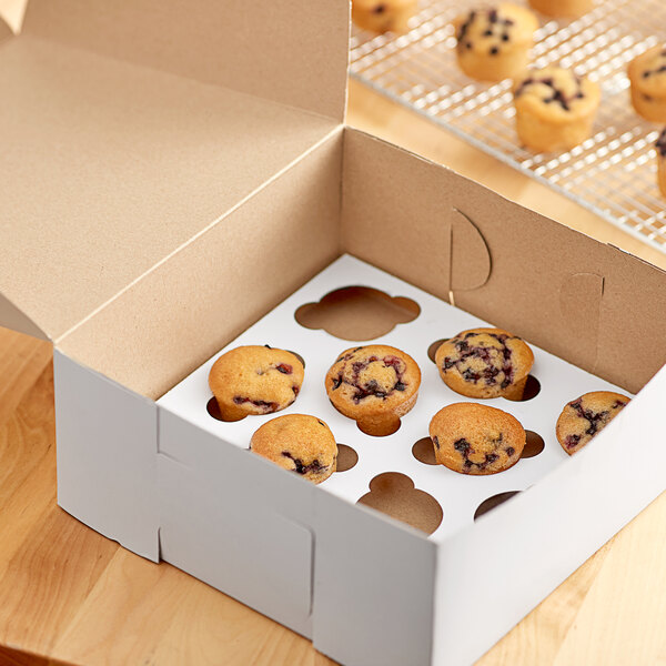 A Baker's Mark reversible cupcake / muffin insert holding a box of 12 mini muffins.