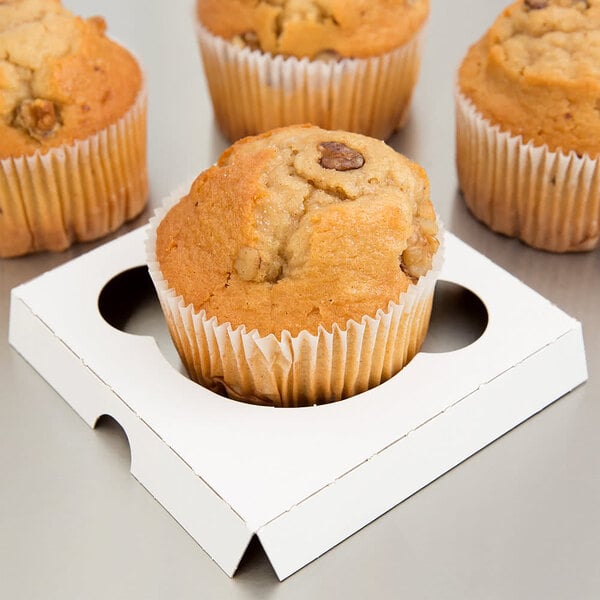 A white Baker's Mark cupcake insert holding a single muffin.