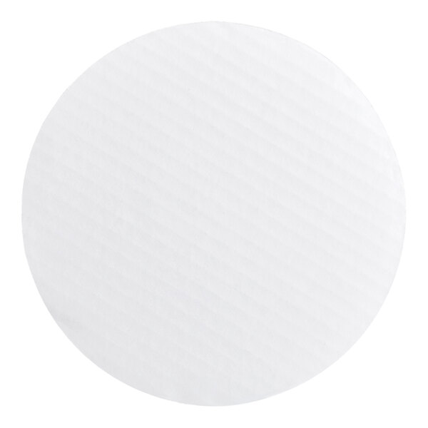 A round, white, corrugated grease-resistant cake circle.