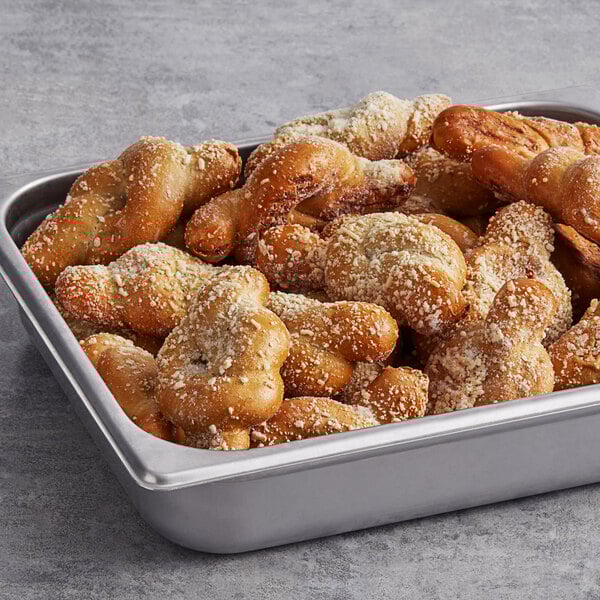 A tray of SuperPretzel Jalapeno Cheese Filled Soft Pretzel Knots.