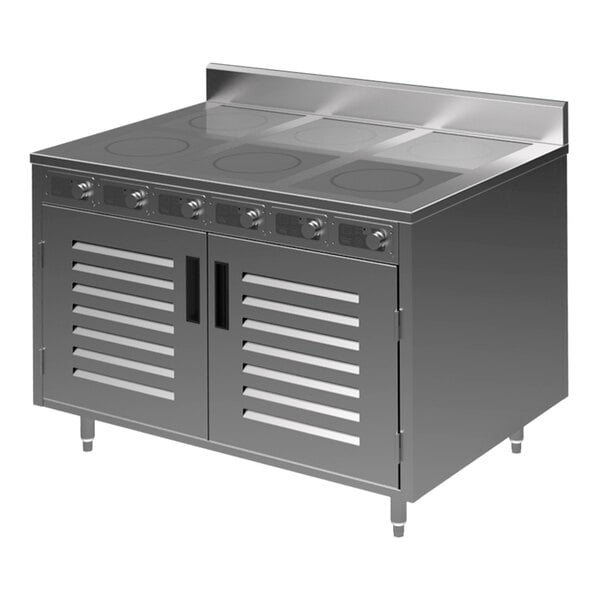 A Spring USA stainless steel induction cooking cabinet with 6 ranges and doors on a counter in a professional kitchen.