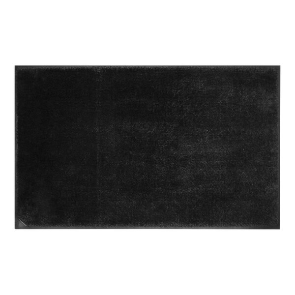 A black rectangular carpet with a black rubber border on a white background.