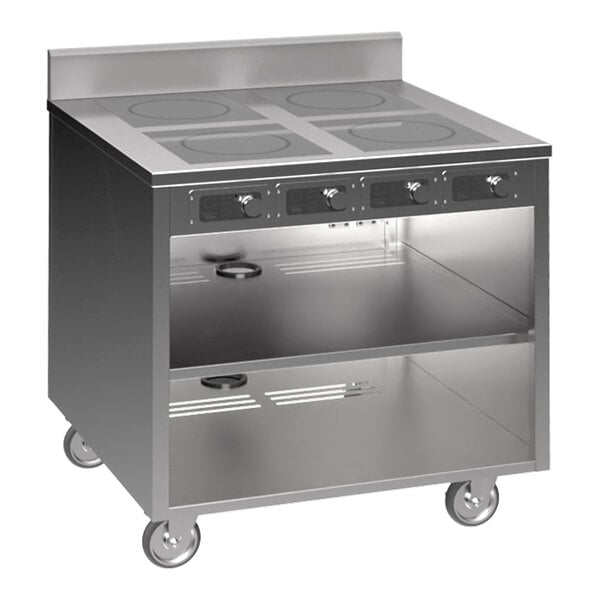 A Spring USA stainless steel mobile induction cooking cart with 4 ranges.